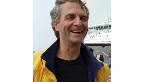 FILE - Commander Paul-Henri Nargeolet laughs, at Black Falcon Pier in Boston on Sept. 1, 1996. The missing submersible Titan imploded near the wreckage of the Titanic, killing all five people aboard, Shahzada Dawood, Suleman Dawood, Paul-Henri Nargeolet, Stockton Rush, and Hamish Harding, the U.S. Coast Guard announced, Thursday, June 22, 2023. (AP Photo/Jim Rogash, File)