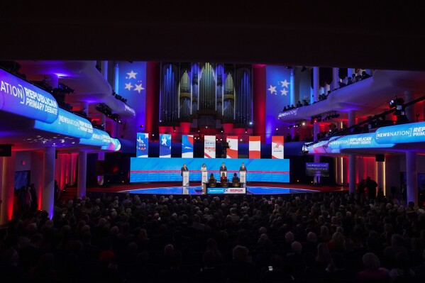 Republican presidential candidate former New Jersey Gov. Chris Christie, former U.N. Ambassador Nikki Haley, Florida Gov. Ron DeSantis and businessman Vivek Ramaswamy participate in a Republican presidential primary debate hosted by NewsNation on Wednesday, Dec. 6, 2023, at the Moody Music Hall at the University of Alabama in Tuscaloosa, Ala. (AP Photo/Gerald Herbert)