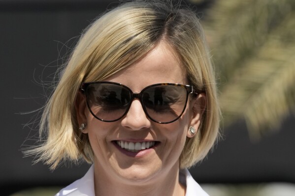 FILE - Susie Wolff, current managing director of the F1 Academy arrives at the Bahrain International Circuit in Sakhir, Bahrain, Thursday, March 2, 2023. Susie Wolff, the wife of Mercedes team boss Toto Wolff said Wednesday, March 20, 2024 she has filed a criminal complaint in the French courts “in relation to statements made about me” by Formula 1's governing body.(AP Photo/Frank Augstein, File)