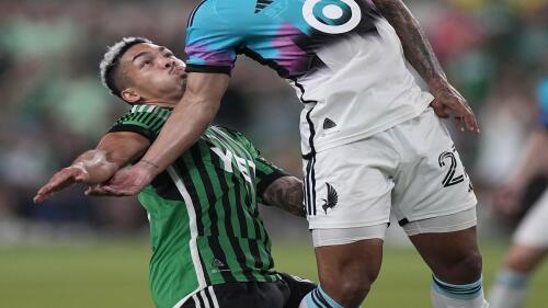 Minnesota United defender D.J. Taylor (27) works with the ball next to Austin FC midfielder Daniel Pereira, left, during the second half of an MLS soccer match Wednesday, May 31, 2023, in Austin, Texas. (AP Photo/Eric Gay)