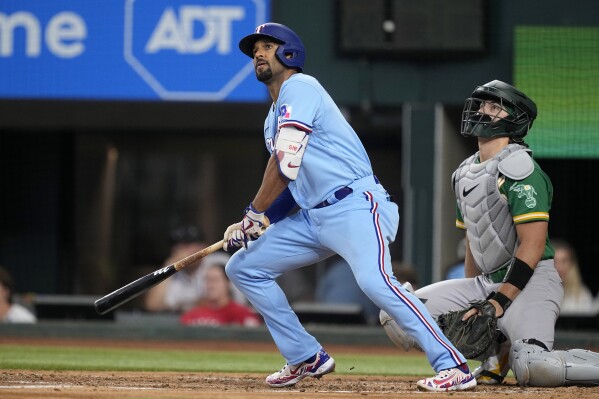 Semien has another 2-HR, 4-hit game as Rangers beat A's 9-4 for