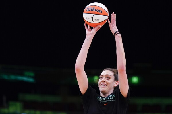 FILE - New York Liberty forward Breanna Stewart warms up before a WNBA basketball game against the Seattle Storm, Tuesday, May 30, 2023, in Seattle. Stewart finished the regular season second in the league in scoring, averaging a career-best 23 points a game. She helped New York secure the second best record in the league and Tuesday became the first player to repeat as The Associated Press WNBA Player of the Year. (AP Photo/Lindsey Wasson, File)