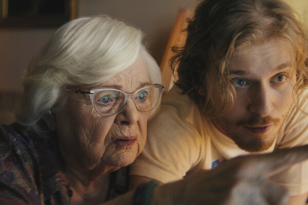 This image released by the Sundance Institute shows June Squibb, left, and Fred Hechinger in a scene from "Thelma" a film by Josh Margolin, an official selection of the Premieres program at the 2024 Sundance Film Festival. (David Bolen/Sundance Institute via AP)