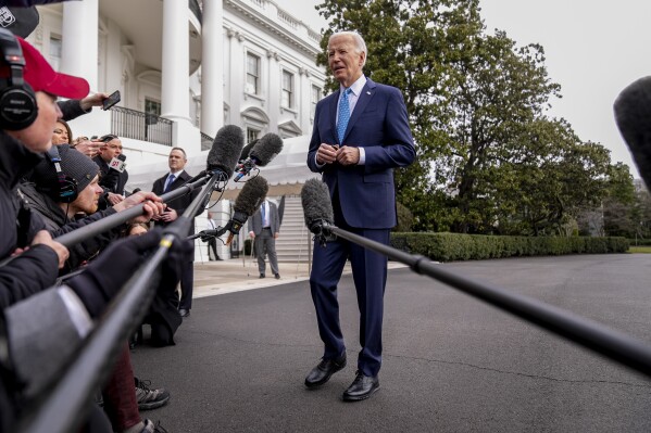 FILE - President Joe Biden speaks to members of the media before boarding Marine One on the South Lawn of the White House in Washington, Jan. 30, 2024. U.S. adults are only feeling slightly better about the economy, despite stocks being near record highs and surprisingly strong growth last year. A new poll from The Associated Press-NORC Center for Public Affairs Research finds that 35% of U.S. adults call the national economy good. (AP Photo/Andrew Harnik, File)