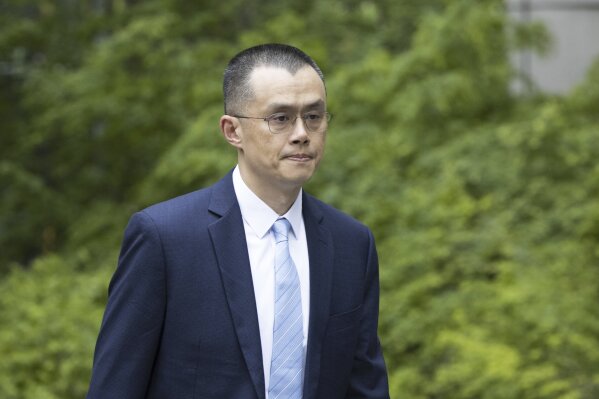 Changpeng Zhao, the founder of Binance, the world’s largest cryptocurrency exchange, enters the Federal Courthouse in Seattle Tuesday, April 30, 2024. Prosecutors are asking a judge on Tuesday to give Zhao a three-year prison term for allowing rampant money laundering on the platform. He pleaded guilty and stepped down as Binance CEO in November as the company agreed to pay $4.3 billion to settle related allegations. (Ellen M. Banner /The Seattle Times via AP)