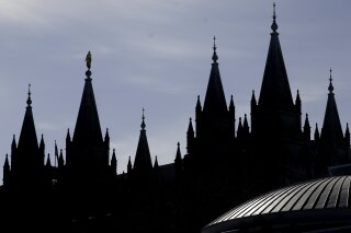 FILE - In this April 4, 2020, file photo, is The Salt Lake Temple of The Church of Jesus Christ of Latter-day Saints in Salt Lake City. James Huntsman, a member of one of Utah's most prominent families and brother of a former governor, sued The Church of Jesus Christ of Latter-day Saints, accusing it of fraud and seeking to recover millions of dollars in contributions. The federal lawsuit, filed Monday, March 22, 2021, asserts that the church spent members’ donations that were solicited for charity on commercial purposes. (AP Photo/Rick Bowmer, File)