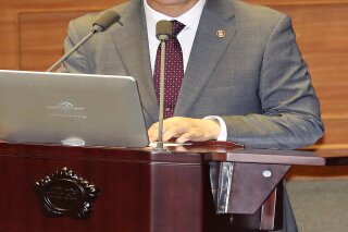 
              In this Oct. 1, 2018 photo, South Korean Unification Minister Cho Myoung-gyon speaks at the National Assembly in Seoul, South Korea.  South Korea says North Korea is estimated to have up to 60 nuclear weapons. Unification Minister Cho told parliament the estimates on the size of North Korea's nuclear arsenal range from 20 bombs to as many as 60.(Kim Hyun-tae/Yonhap via AP)
            