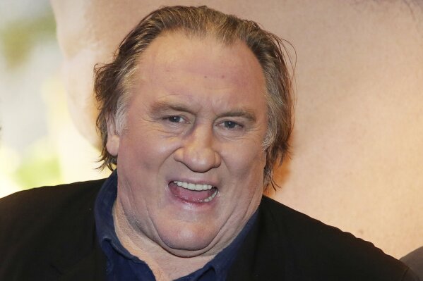 FILE - In this Monday, Nov. 14, 2016 file photo, actor Gerard Depardieu attends the premiere of the movie "Tour de France", in Paris.  The Paris prosecutor’s office said Tuesday Feb. 23, 2021, commenting on charges after they were leaked to the French press, saying that French actor Gerard Depardieu was handed preliminary rape and sexual assault charges on Dec. 16, 2020, without the actor being detained. (AP Photo/Thibault Camus, File)