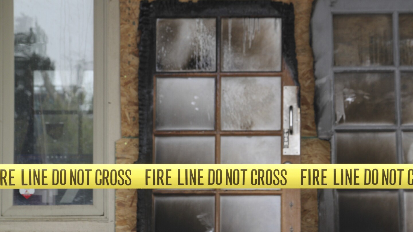 Justice Department charges man with arson at New Mexico Tesla dealership and GOP headquarters