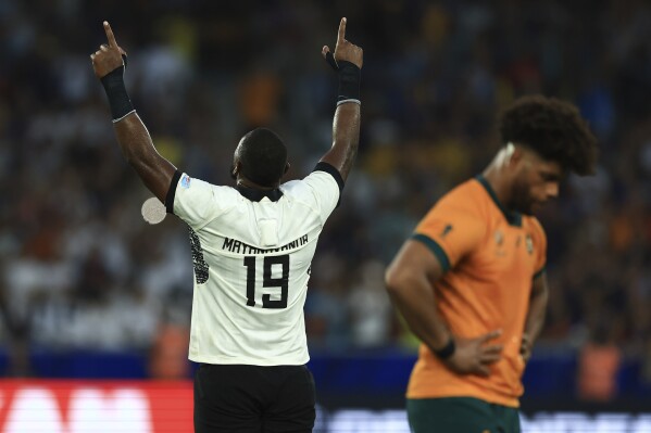 Fiji's Temo Mayanavanua celebrates after the Rugby World Cup Pool C match between Australia and Fiji at the Stade Geoffroy Guichard in Saint-Etienne, France, Sunday, Sept. 17, 2023. (AP Photo/Aurelien Morissard)