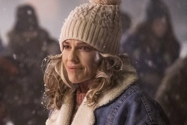 This image released by Lionsgate shows Hilary Swank in a scene from "Ordinary Angels." (Allen Fraser/Lionsgate via AP)