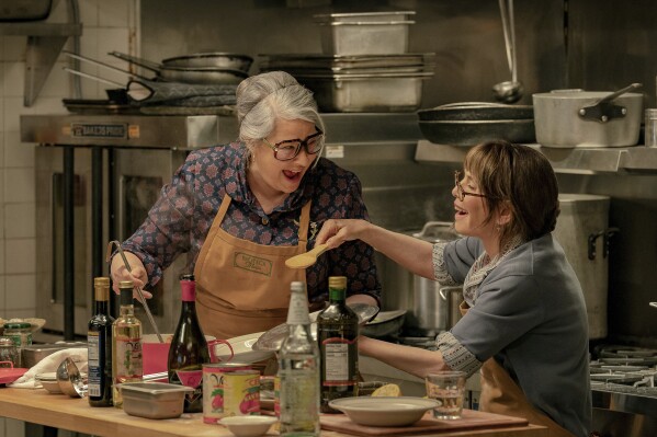 Lorraine Bracco, left, and Talia Shire in a scene from "Nonnas." (Jeong Park/Netflix via AP)