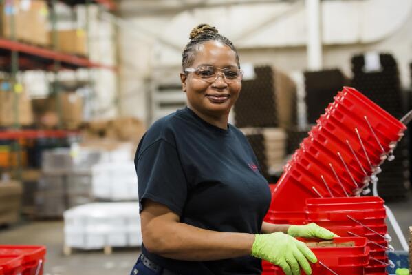 This photo provided by Towards Employment shows Mary Lamar working at Talan Products in Cleveland in 2023. She got her job through a program developed by business and community leaders — with help from philanthropy — to match people of color, women, and formerly incarcerated people with manufacturing jobs. (Mariana Edelman/Towards Employment via AP)