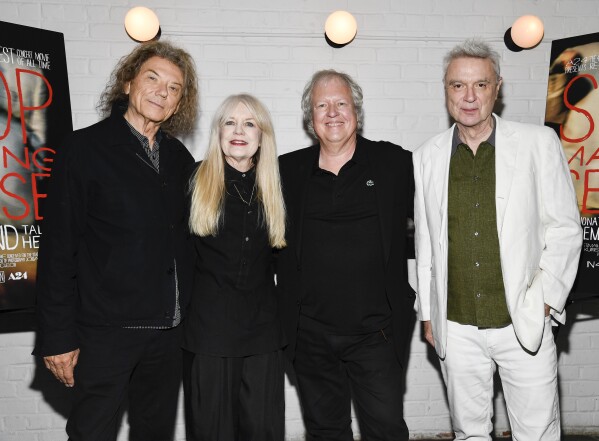 Musicians Jerry Harrison, left, Tina Weymouth, Chris Frantz and David Byrne of the Talking Heads pose together at a special screening of "Stop Making Sense" to celebrate the 40th anniversary 4k remastered rerelease at Metrograph on Thursday, Sept. 14, 2023, in New York. (Photo by Evan Agostini/Invision/AP)