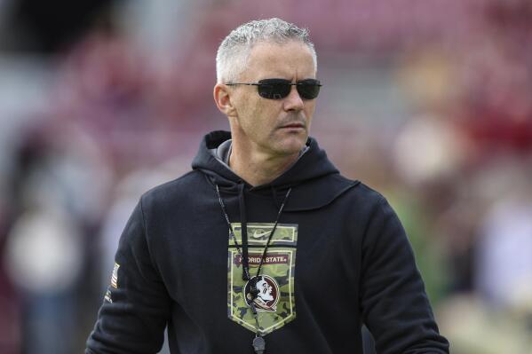Florida State head coach Mike Norvell walks the field before an NCAA college football game against Louisiana on Saturday, Nov. 19, 2022, in Tallahassee, Fla. (AP Photo/Gary McCullough)