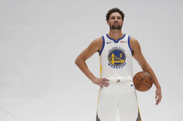 Golden State Warriors' Klay Thompson poses for photos during the NBA basketball team's media day in San Francisco, Monday, Oct. 2, 2023. (AP Photo/Jeff Chiu)