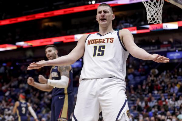 Denver Nuggets center Nikola Jokic (15) reacts to a foul called in the second quarter of an NBA basketball game against the New Orleans Pelicans in New Orleans, Friday, Jan. 28, 2022. (AP Photo/Derick Hingle)