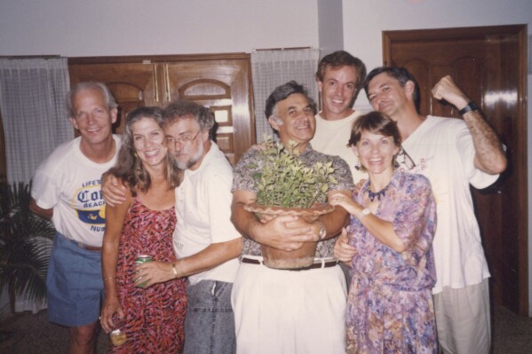 This photo provided by Lyne Paquette shows her with friends in Dhaka, Bangladesh, in the summer of 1992. After retiring in 2021 from a long career as a U.S. diplomat who worked all over the world, Paquette returned to her home in Chapel Hill, N.C., and retrieved from storage 12,000 images that she had taken from her film camera during her wide-ranging travels. After spending months sorting through them all, Paquette sent about 3,500 to be digitized. (Courtesy Lyne Paquette via AP)