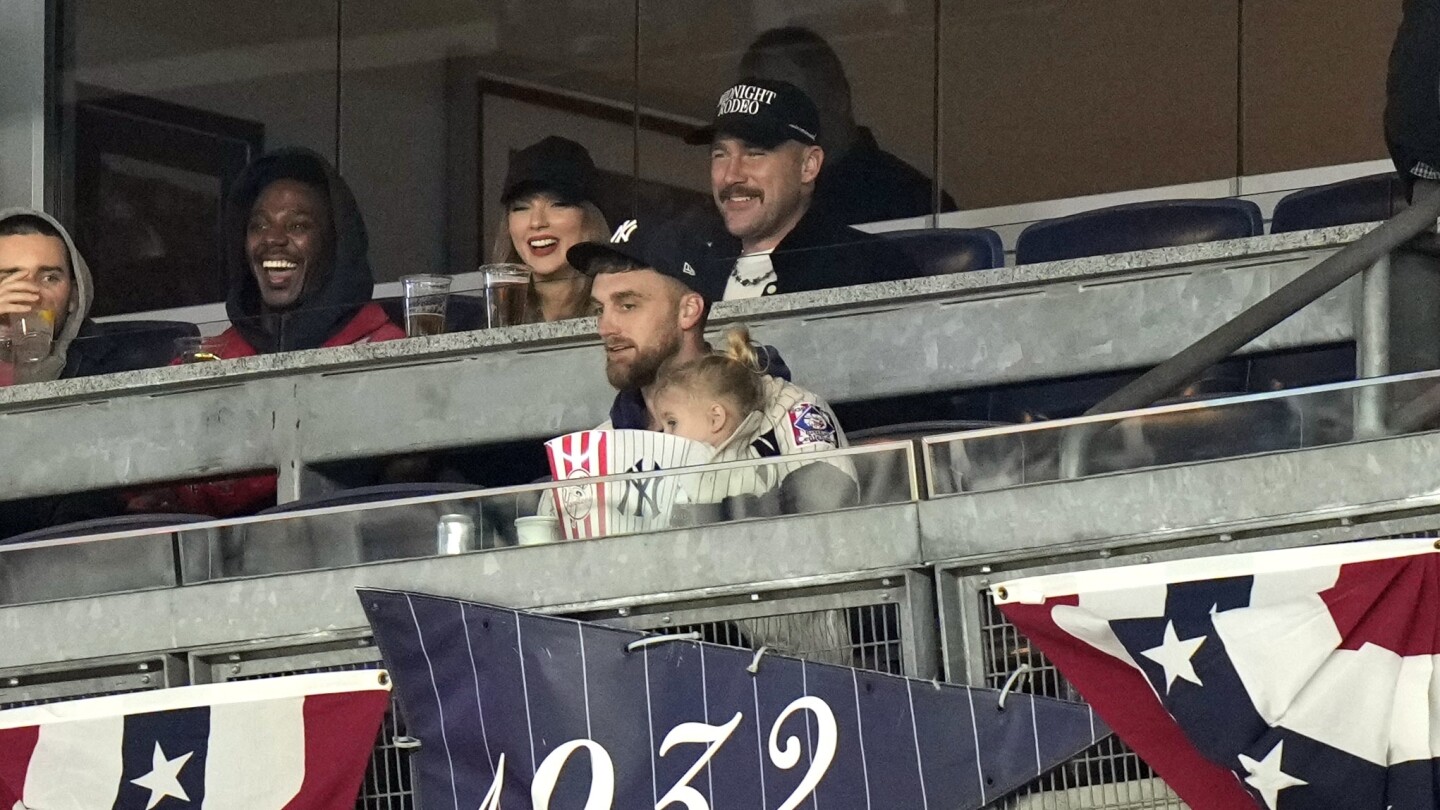 Taylor Swift and Travis Kelce attend the ALCS game at Yankee Stadium