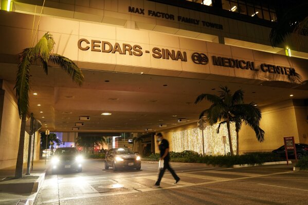 Cedars-Sinai Medical Center is pictured, late Tuesday, Jan. 5, 2021, in Los Angeles. Music producer and hip hop legend Dr. Dre is hospitalized in the intensive care unit at Cedars-Sinai after suffering a brain aneurysm Monday. (AP Photo/Chris Pizzello)