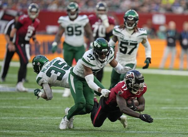 Kelvin Hayden of the Atlanta Falcons runs with an interception