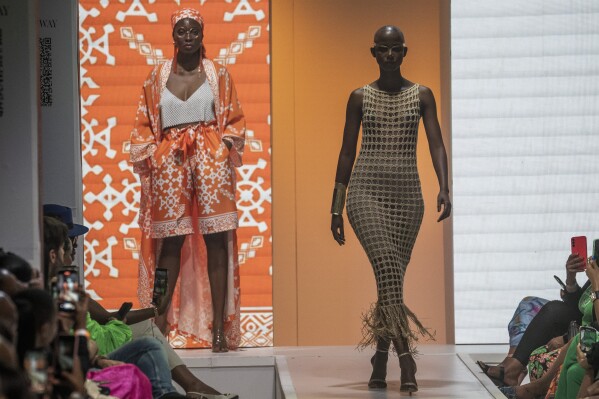 Models wear creations by Niger's designer Alia Bare during Johannesburg Fashion Week 2023 in Johannesburg, South Africa, Thursday, Nov. 9, 2023. (AP Photo/Jerome Delay)