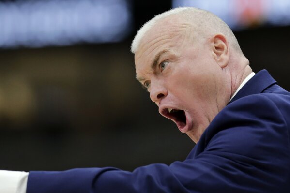 
              Penn State head coach Patrick Chambers directs his team during the first half of an NCAA college basketball game against the Minnesota in the second round of the Big Ten Conference tournament, Thursday, March 14, 2019, in Chicago. (AP Photo/Kiichiro Sato)
            