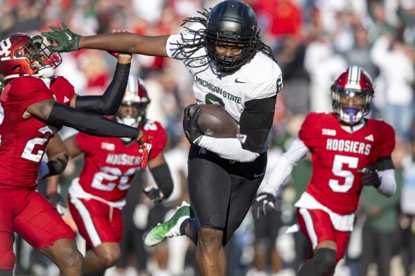 Michigan State tight end Maliq Carr (6) runs into the end zone to score during the second half of an NCAA college football game against Indiana, Saturday, Nov. 18, 2023, in Bloomington, Ind. (AP Photo/Doug McSchooler)