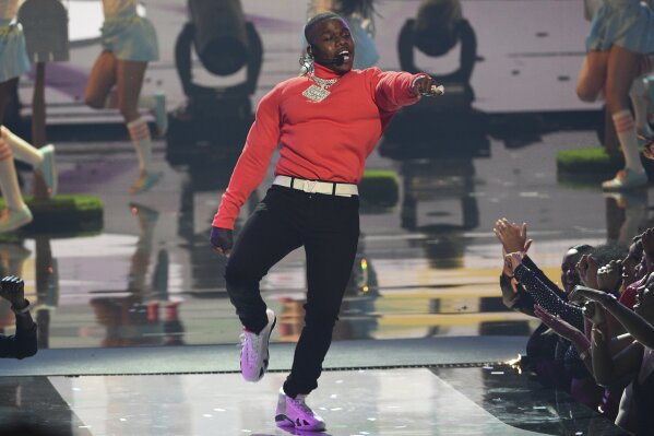 FILE - In this June 23, 2019 file photo, DaBaby performs "Sugar" at the BET Awards at the Microsoft Theater in Los Angeles. DaBaby, Guns N’ Roses, Maroon 5 and DJ Khaled will perform at the second annual Bud Light Super Bowl Music Fest, to take place Jan. 30 through Feb. 1 at AmericanAirlines Arena in Miami.  (Photo by Chris Pizzello/Invision/AP, File)