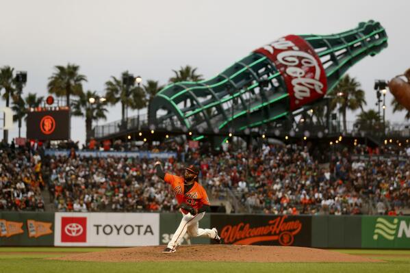 San Francisco Giants' Johnny Cueto throws against the Oakland Athletics during the fifth inning of a baseball game in San Francisco, Friday, June 25, 2021. (AP Photo/Jed Jacobsohn)