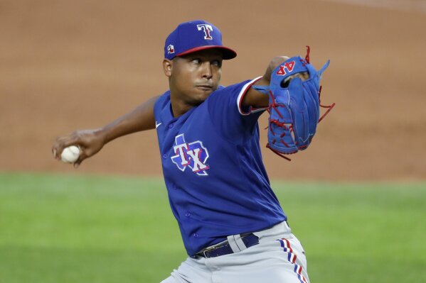 FILE - Texas Rangers pitcher Jose Leclerc throws to the plate during an intrasquad game baseball game at Globe Life Field in Arlington, Texas, in this Thursday, July 9, 2020, file photo. The Texas Rangers are expecting to be without one-time closer José Leclerc for an extended time because of right elbow soreness, the latest setback for a bullpen already missing another key late-inning arm for at least two months.
General manager Chris Young said Monday, March 22, 2021, that Leclerc reported soreness after a recent outing, and the right-hander has returned to Texas to be evaluated by team physician Dr. Keith Meister. (AP Photo/Tony Gutierrez, File)