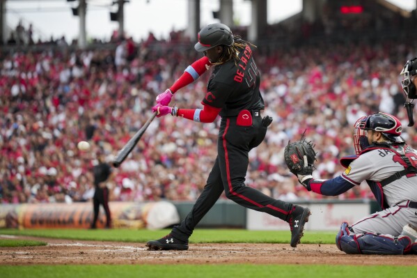 Rallying Reds do it again, defeat Braves 11-10 in wild game at