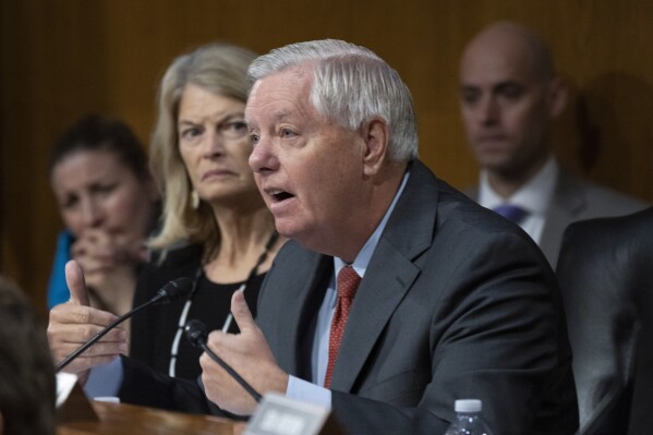 Sen. Lindsey Graham, R-S.C., with Sen. Lisa Murkowski, R-Alaska, questions Secretary of State Antony Blinken and Defense Secretary Lloyd Austin testifying before a Senate Appropriations Committee hearing to examine the national security supplemental request, on Capitol Hill in Washington, Tuesday, Oct. 31, 2023. (AP Photo/Manuel Balce Ceneta)