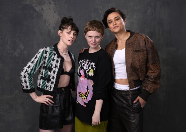 Rose Glass, center, director/co-writer of the film "Love Lies Bleeding," poses with cast members Kristen Stewart, left, and Katy M. O'Brian at the Four Seasons Hotel, Monday, March 4, 2024, in Los Angeles. (AP Photo/Chris Pizzello)