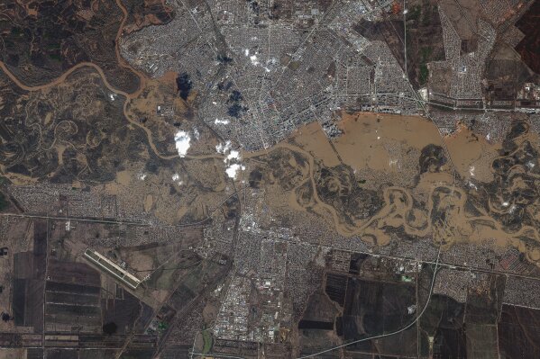 This image provided by Maxar Technologies, shows flooded areas in Orenburg, Russia, Thursday, April 11, 2024. (Satellite image ©2024 Maxar Technologies via AP)