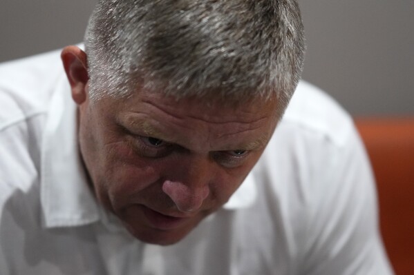 Former Slovak Prime Minister and head of leftist SMER - Social Democracy party Robert Fico looks up during an interview with The Associated Press prior his election rally in Michalovce, Slovakia, Wednesday, Sept. 6, 2023. Fico, who led Slovakia from 2006 to 2010 and again from 2012 to 2018, might reclaim the prime minister's office after the Sept. 30 election. He and his left-wing Direction ("Smer")-Social Democracy party have campaigned on a clear pro-Russian and anti-American message. (AP Photo/Petr David Josek)