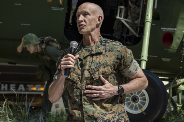 This image provided by the U.S. Marine Corps shows U.S. Marine Corps Lt. Gen. James Glynn speaking during the Wounded Warrior Regiment change of command at the National Museum of the Marine Corps in Triangle, Va., July 14, 2023. The Pentagon has sent military advisers to Israel to aid in its war planning and is speeding multiple sophisticated air defense systems to the Middle East days ahead of an anticipated ground assault into Gaza. One of the officers leading the assistance is Glynn, who previously helped lead special operations forces against the Islamic State and served in Fallujah, Iraq, during some of the most heated urban combat there, according to a U.S. official who was not authorized to discuss Glynn’s role and spoke on the condition of anonymity. (Cpl. Mitchell Johnson/U.S. Marine Corps via AP)