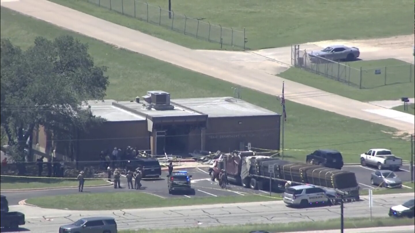 Multiple injuries, arrest made after semitrailer crashes into public safety office in Texas