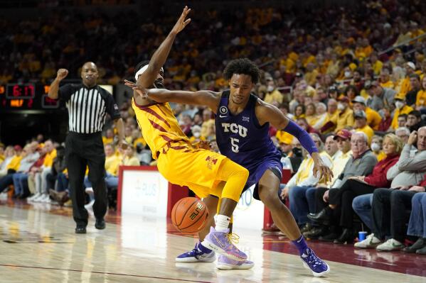 TCU forward Chuck O'Bannon Jr. (5) is fouled by Iowa State guard Tre Jackson, left, during the second half of an NCAA college basketball game, Saturday, Jan. 22, 2022, in Ames, Iowa. (AP Photo/Charlie Neibergall)