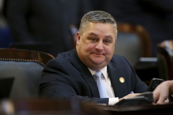 FILE - Shane Wilkin, Ohio Senate Republican from the 17th District, listens to debate at the Ohio State House Senate Chambers in Columbus, Ohio, Wednesday, Feb. 28, 2024. Wilkin is one of 11 candidates vying for the Republican nomination for a seat in Ohio’s 2nd Congressional District, which extends from suburban Cincinnati to the West Virginia border. The winner of the primary will face Democrat Samantha Meadows in the November general election. (AP Photo/Joe Maiorana, File)