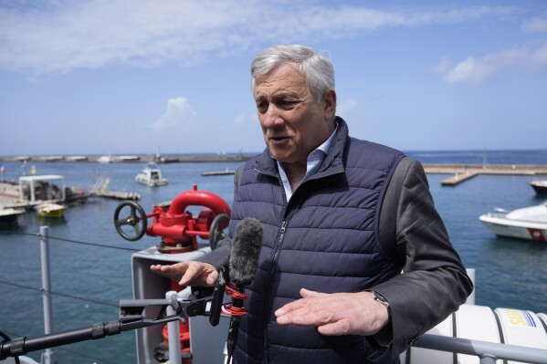Italian Foreign Minister Antonio Tajani speaks during an interview with The Associated Press as he arrives for a G7 Foreign Ministers meeting in the Italian southern island of Capri, Wednesday, April 17, 2024. The Group of Seven foreign ministers are meeting on the Italian resort island of Capri, with soaring tensions in the Mideast and Russia's continuing war in Ukraine topping the agenda. The meeting runs April 17-19. (AP Photo/Gregorio Borgia)
