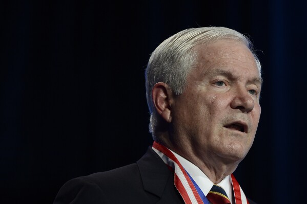 FILE - Former Defense Secretary Robert Gates addresses the Boy Scouts of America's annual meeting on Friday, May 23, 2014, in Nashville, Tenn. Gates will have an academic building named after him at William & Mary, the university in Virginia where he holds the honorary position of chancellor, the school announced Wednesday, March 20, 2024. (AP Photo/Mark Zaleski, File)