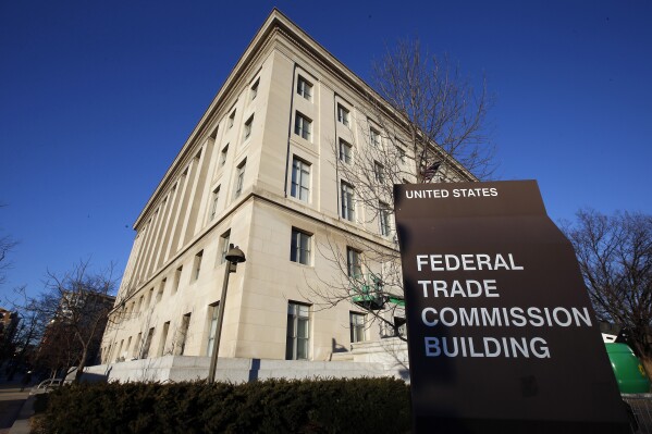 FILE - The Federal Trade Commission building is seen, Jan. 28, 2015, in Washington. Many current and former BetterHelp customers have begun receiving refund eligibility notices spanning from a $7.8 million settlement reached with the online therapy provider last year over allegations that it shared sensitive health data with advertisers. In 2023, the U.S. Federal Trade Commission charged California-based BetterHelp with disclosing consumer data it had promised to keep private — including information about mental health challenges — with companies like Facebook and Snapchat for advertising purposes. (AP Photo/Alex Brandon, File)