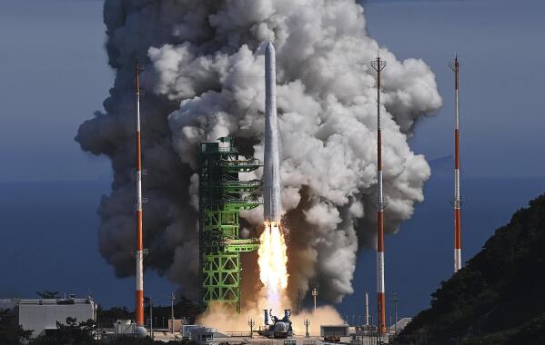 The Nuri rocket, the first domestically produced space rocket, lifts off from a launch pad at the Naro Space Center in Goheung, South Korea, Tuesday, June 21, 2022. South Korea launched its first domestically built space rocket on Tuesday in the country's second attempt, months after its earlier liftoff failed to place a payload into orbit. (Korea Pool/Yonhap via AP)