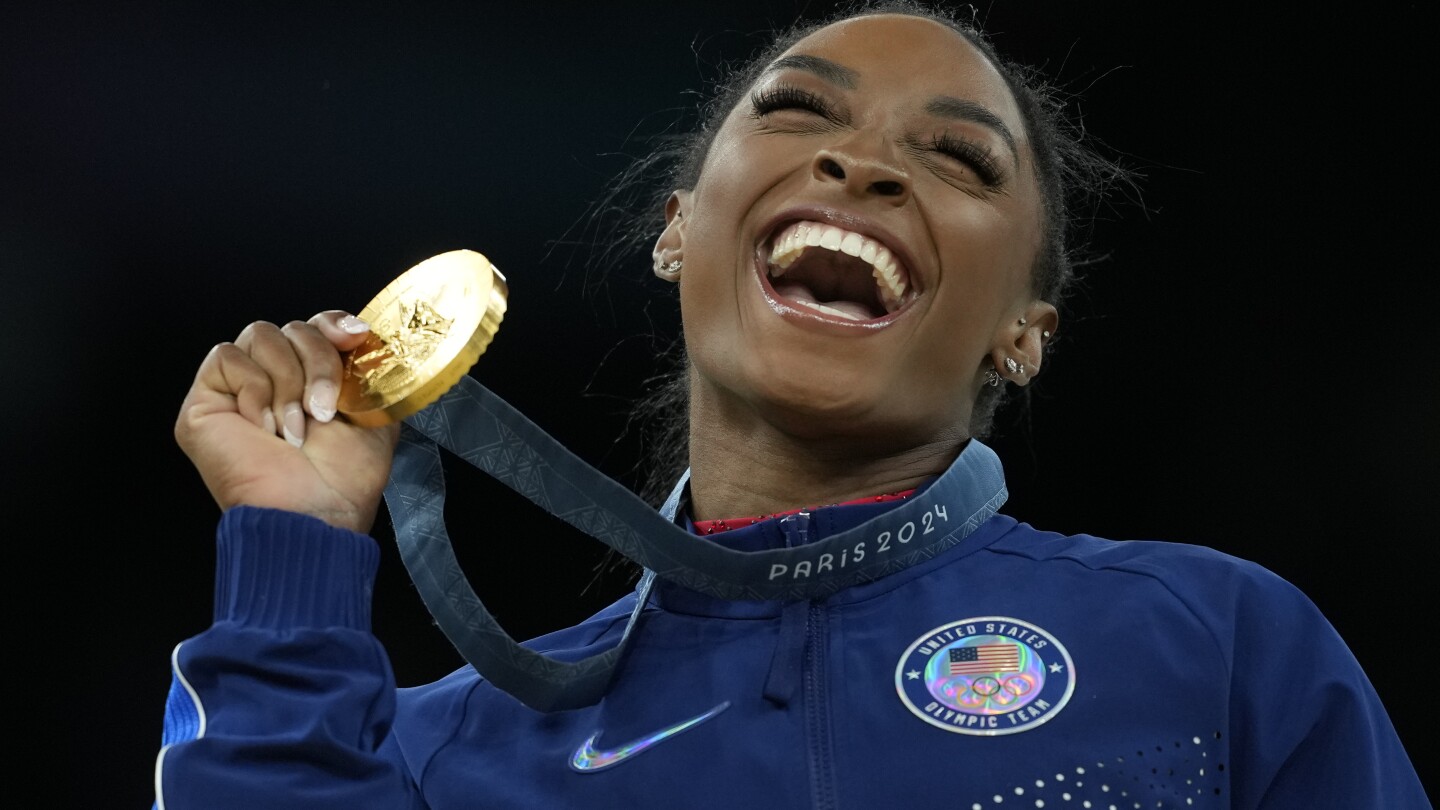 Simone Biles earns seventh Olympic gold medal by winning women's vault