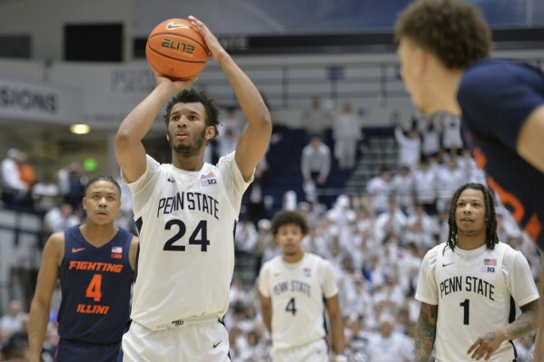 Penn State's Zach Hicks shoots a free throw against Illinois near the enf of an an NCAA college basketball game Wednesday, Feb. 21, 2024, in State College, Pa. Hicks made three free throws. (AP Photo/Gary M. Baranec)