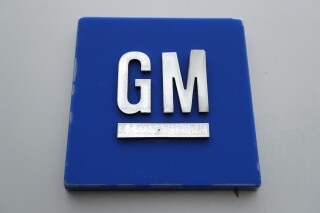 FILE - A General Motors logo is displayed outside the General Motors Detroit-Hamtramck Assembly plant on Jan. 27, 2020, in Hamtramck, Mich. General Motors is adding about 350,000 miles (563,000 kilometers) of roadways in the U.S and Canada to the area where drivers can use the company's “Super Cruise” partially automated driving system. (AP Photo/Paul Sancya, File)