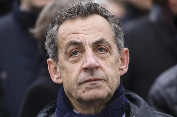 FILE - In this Monday Nov. 11, 2019 file photo, French former president Nicolas Sarkozy attends a ceremony at the Arc de Triomphe in Paris. Sarkozy is facing potential prison term in a verdict to be rendered on Thursday, Sept. 30, 2021 about campaign financing in his unsuccessful 2012 re-election bid. Sarkozy, France’s president from 2007 to 2012, has vigorously denied wrongdoing during the May-June trial. (Ludovic Marin/Pool via AP, file)