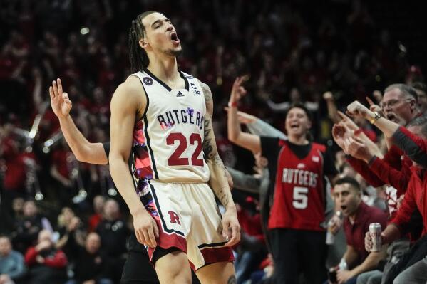 Rutgers' Caleb McConnell (22) celebrates after making a three-point shot during the second half of an NCAA college basketball game, Wednesday, Feb. 1, 2023, in Piscataway, N.J. Rutgers won 90-55. (AP Photo/Frank Franklin II)