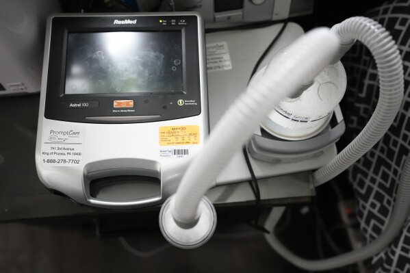 One of Temple University doctoral student Jaggar DeMarco's ventilators is seen at his home in Philadelphia, Wednesday, March 6, 2024. DeMarco said Aetna denied a request for a second breathing machine, and then several appeals. Eventually, his father’s employer essentially overruled the insurer and allowed coverage. (AP Photo/Matt Rourke)